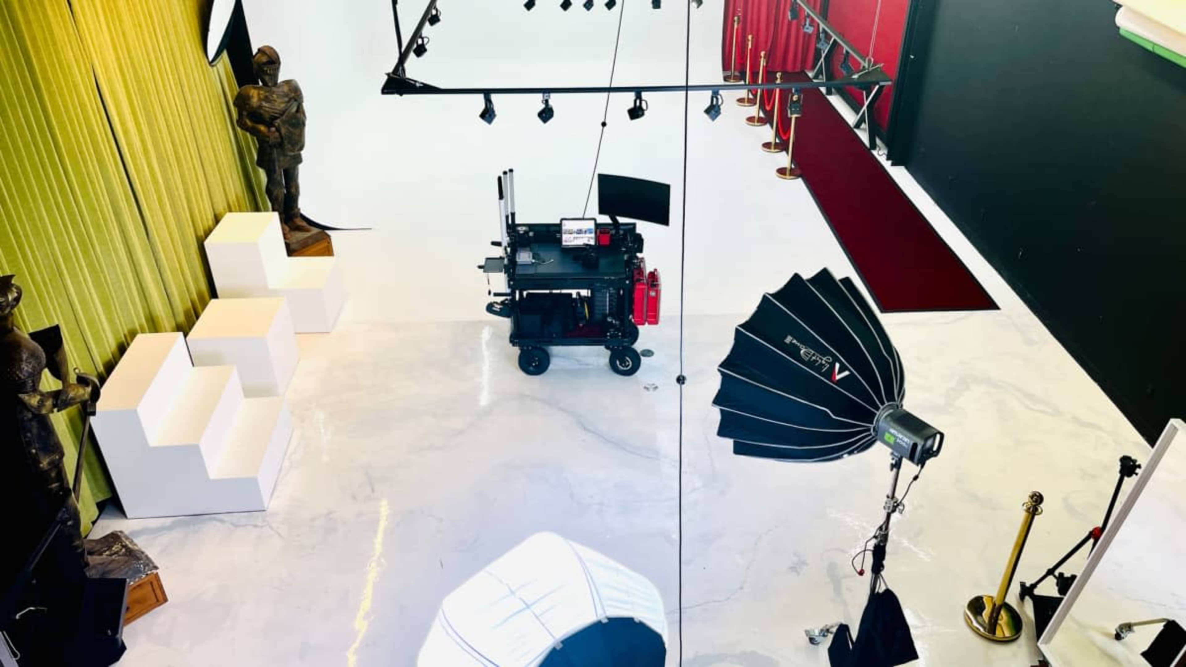 A view across RVXSTUDIO’s white studio floor and photography equipment